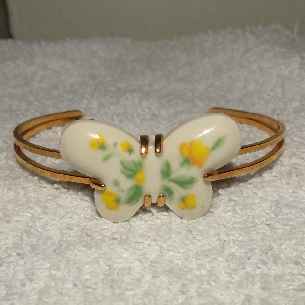 Avon Gold-Tone Bracelet with White Butterfly and Yellow Floral Detail